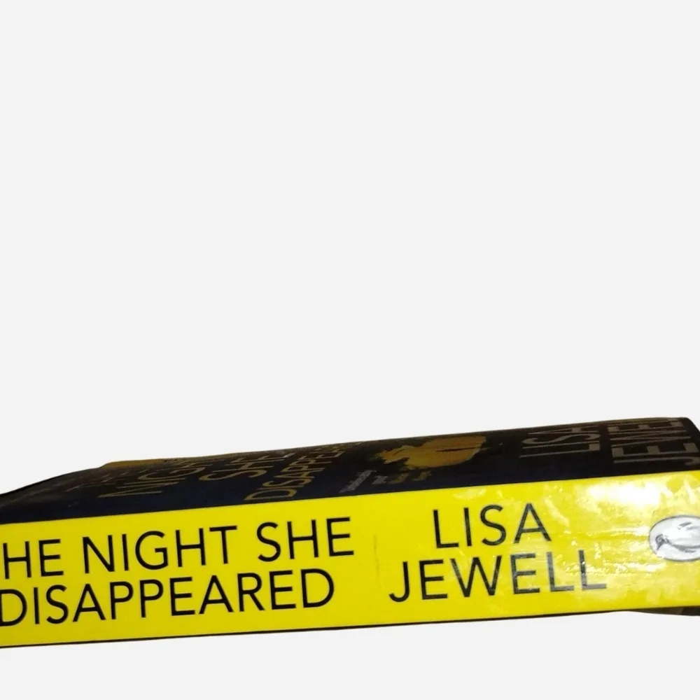 The paperback novel The Night She Disappeared by Lisa Jewell